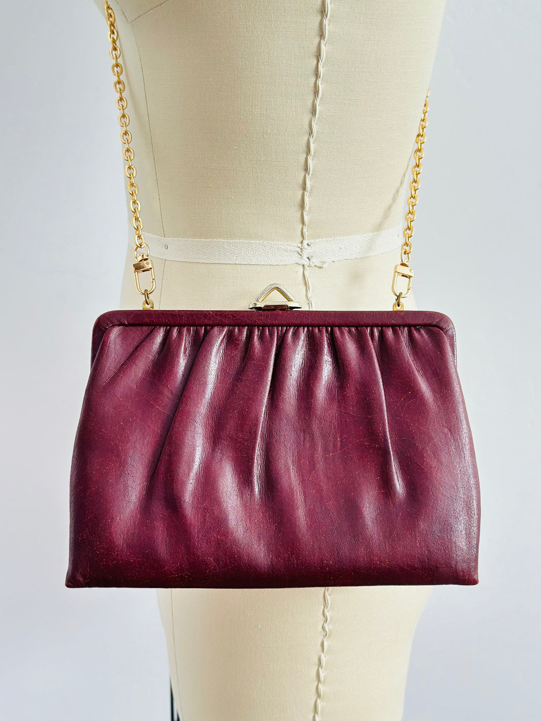 Vintage burgundy leather clutch/crossbody bag