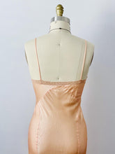 Load image into Gallery viewer, back of a satin slip
