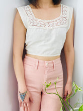 Load image into Gallery viewer, 1910s Edwardian White Crochet Lace top with pink high waisted pants on model

