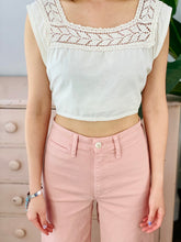 Load image into Gallery viewer, closeup of 1910s Edwardian White Crochet Lace top with pink high waisted pants on model
