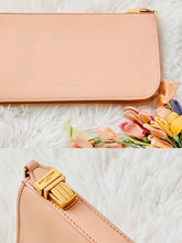 Load image into Gallery viewer, vintage pink YSL wallet with gold buckle and zipper 

