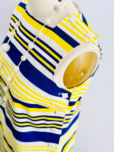 square buttons on a 1960s yellow and blue striped top