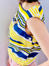 Load image into Gallery viewer, 1960s yellow and blue striped top with side square buttons on model
